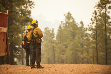A crew from Telluride, Colorado keeps an eye on the fire.