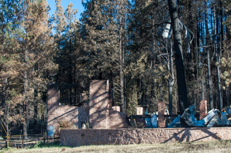 A home in Greer, AZ is completely destroyed during the Wallow Fire.